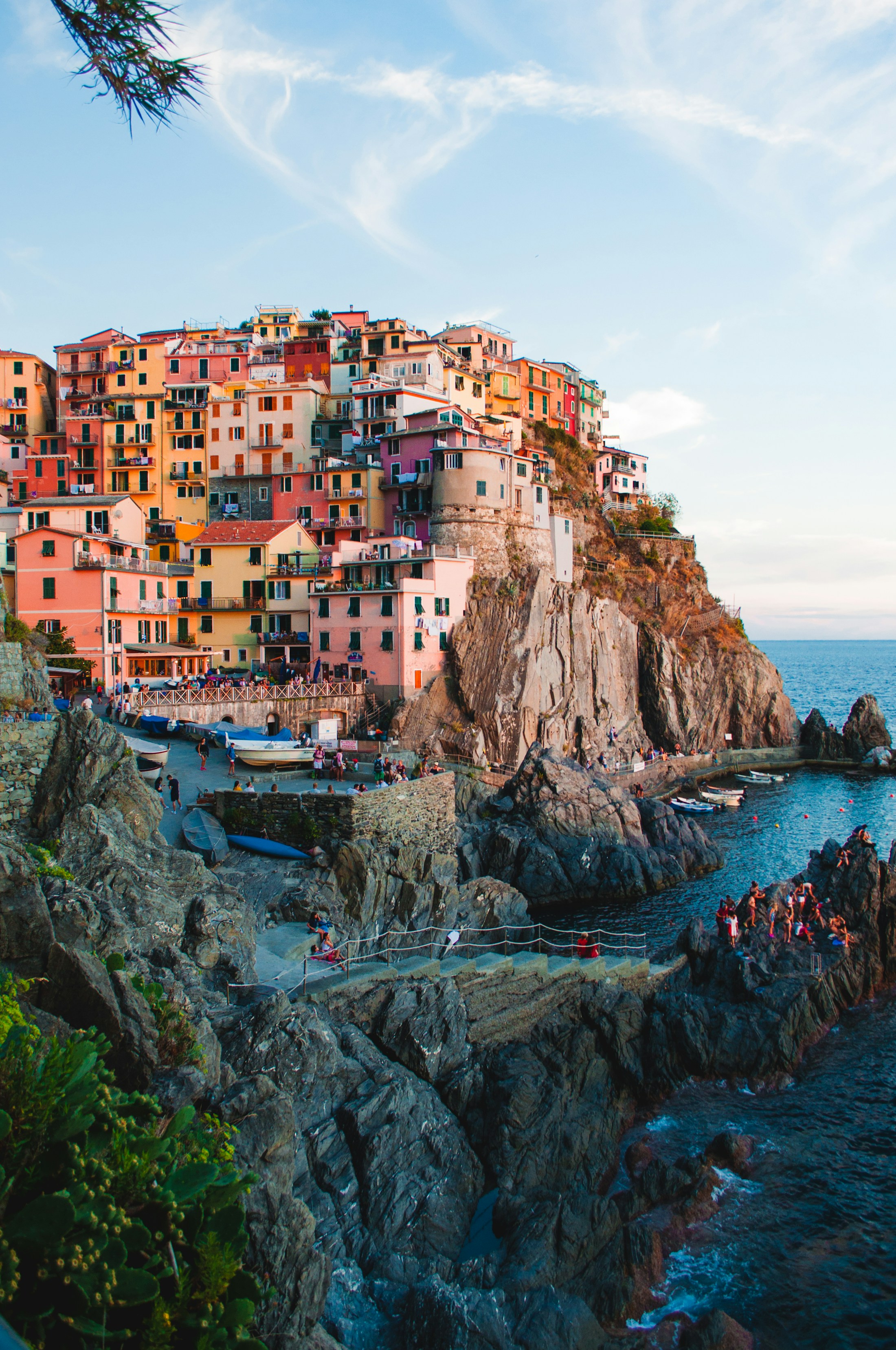 Sunlit Mediterranean coastline with colorful seaside villages